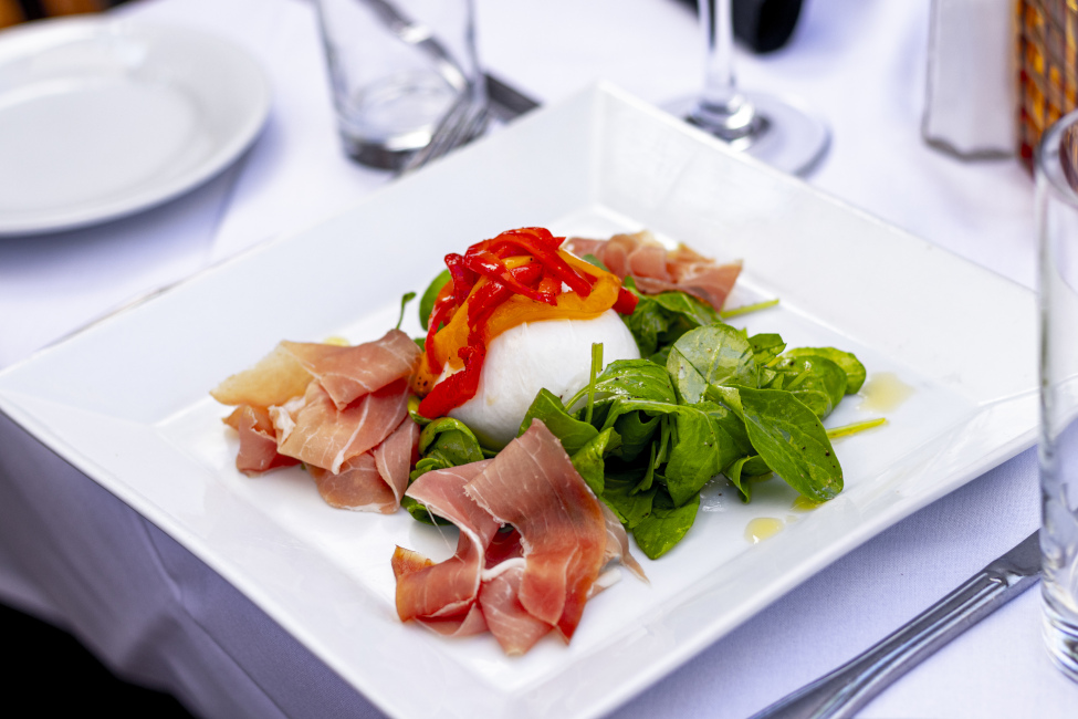 burrata and ham dish